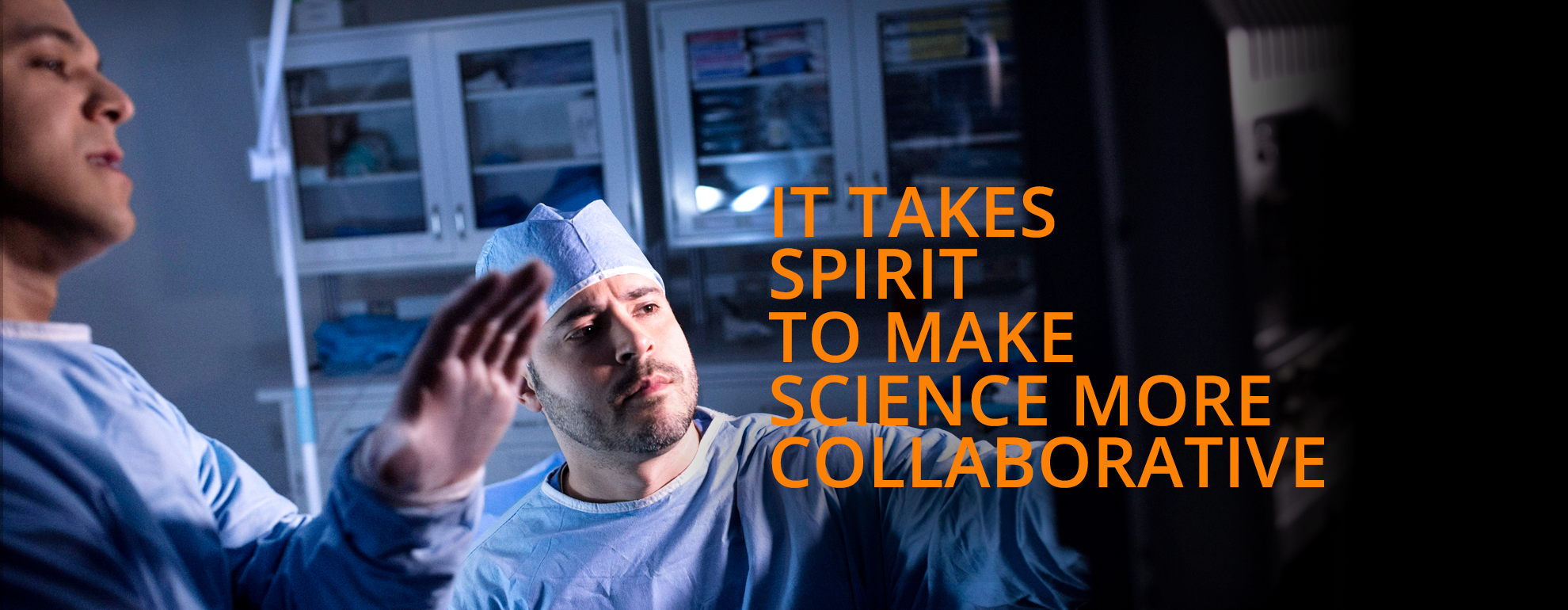 Background image with doctors looking at screen. Animated text "It takes imagination to make science more transformative. It takes spirit to make science more collaborative. It takes grit to make science more purposeful."