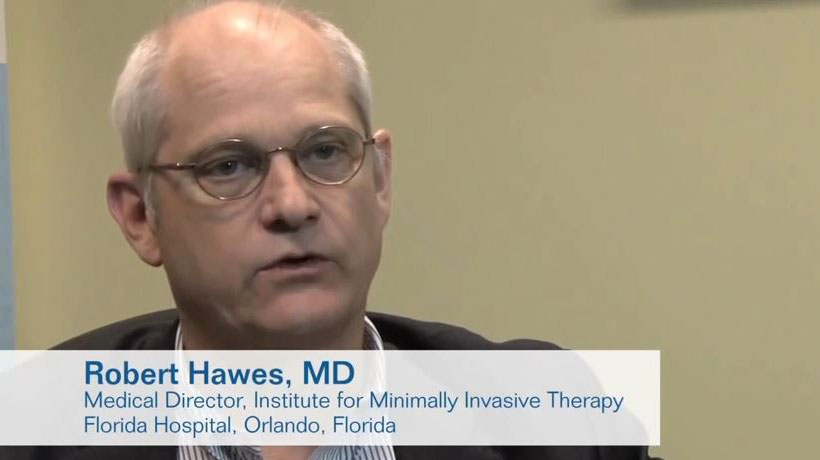 Image of Dr. Robert Hawes with link to video on "What is a colonoscopy"