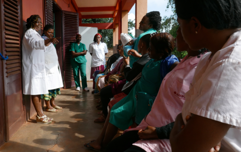 a-line-of-women-in-an-underserved-region-waiting-for-a-diagnostic-exam