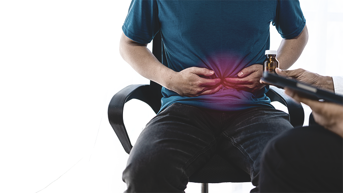 Picture of patient holding stomach in pain​