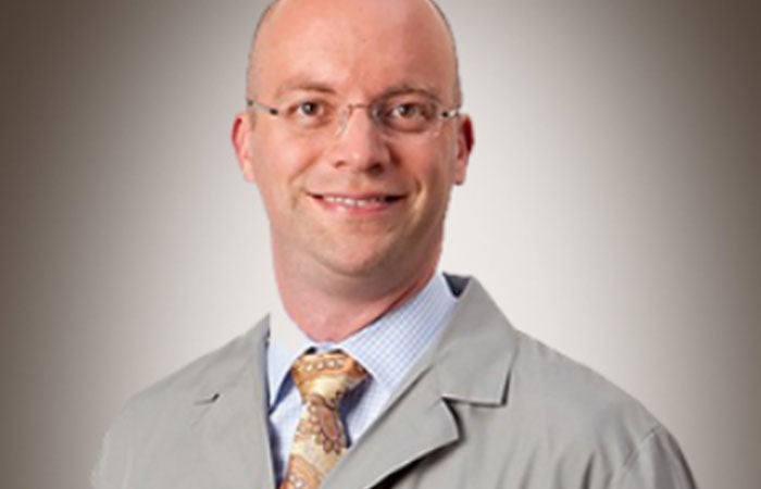 Headshot of Justin Cohen, M.D.