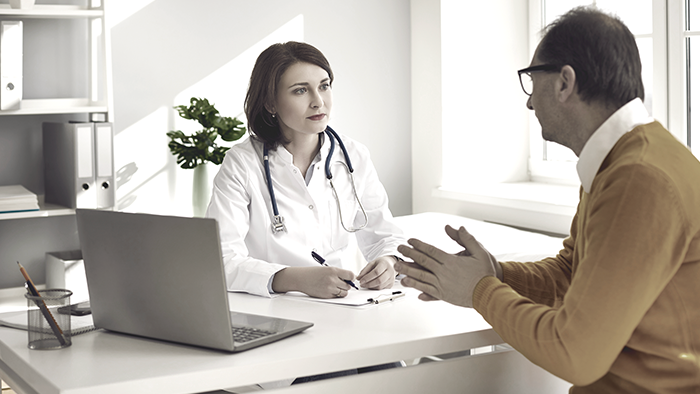 Patient talking with doctor