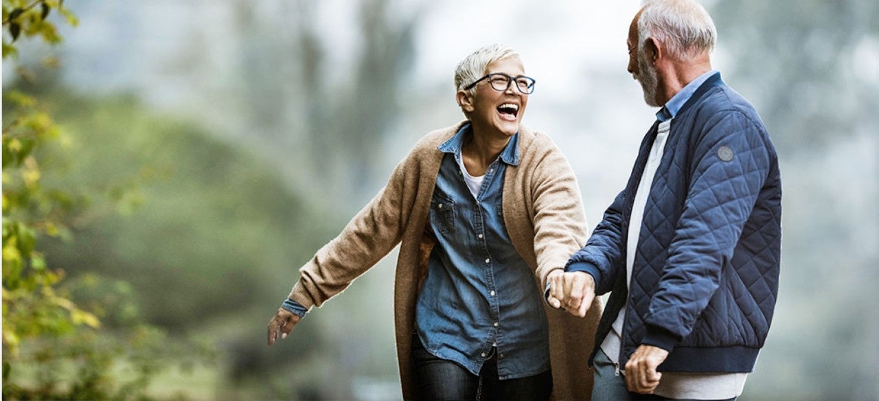 Couple laughing on a walk