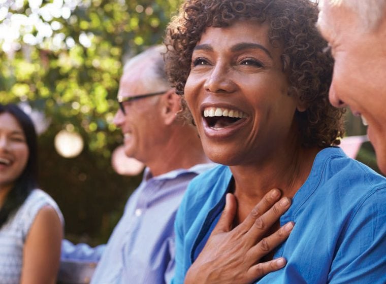 Woman laughing outside