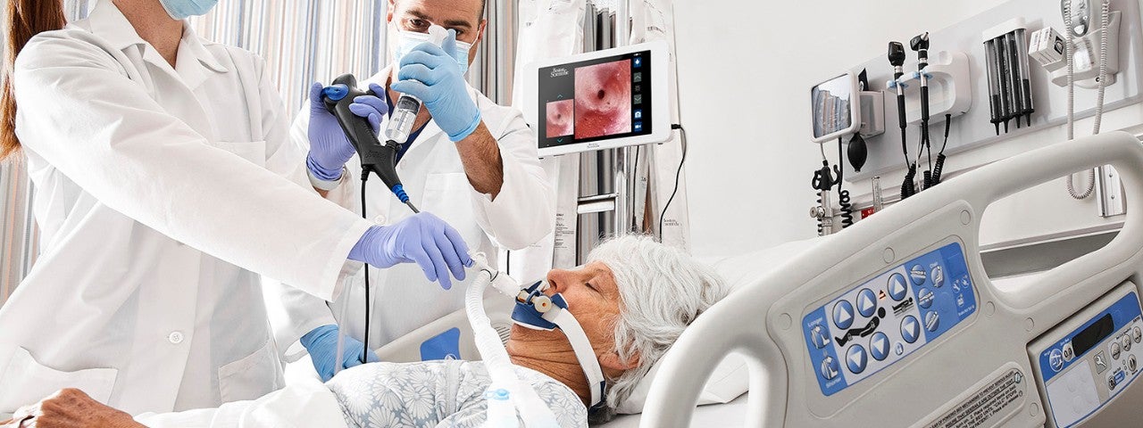 doctor in mask looking down