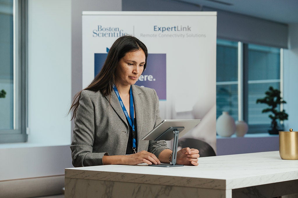 Representative giving support via tablet