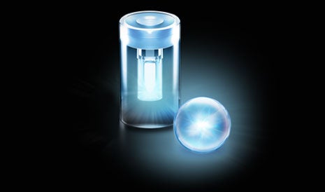 TheraSphere™ Y-90 Glass Microsphere and vial on black background.