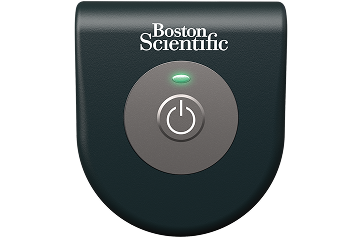 Boston Scientific charger with illuminated green status light and central power button.