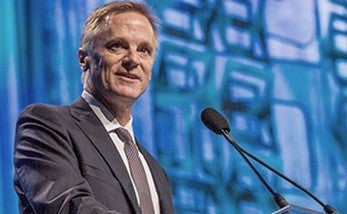 Boston Scientific CEO Michael F. Mahoney speaking into microphone.