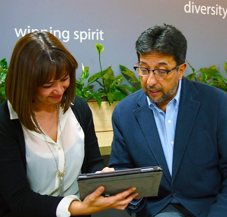 Healthcare professionals having a discussion with the help of tablet