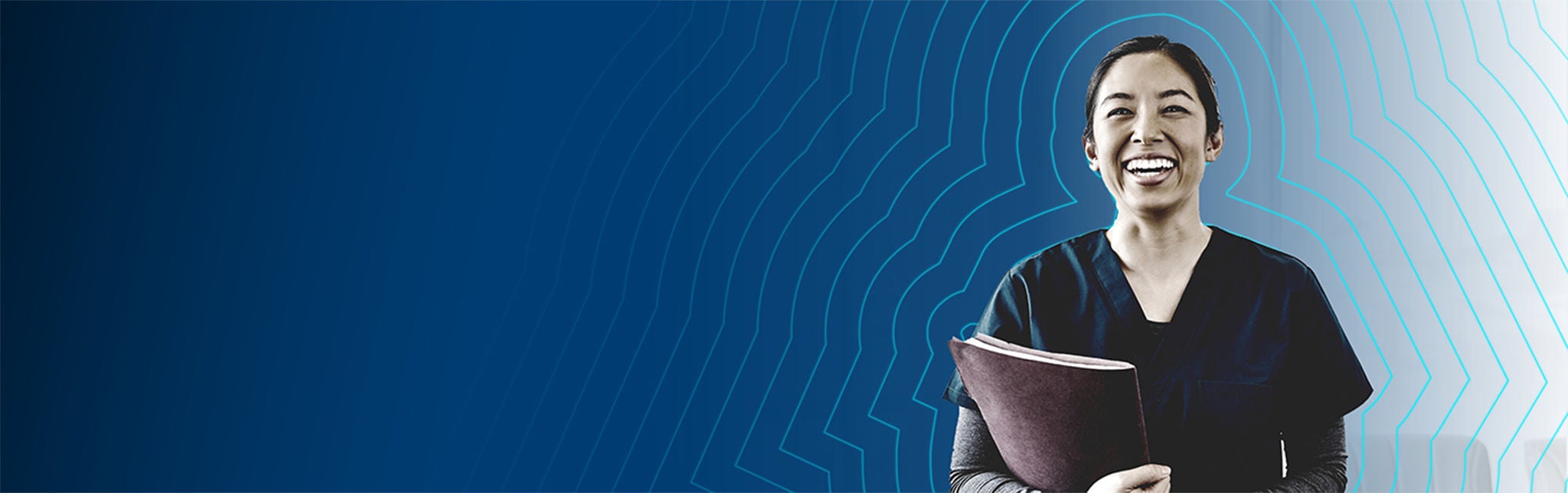 Smiling healthcare provider holding folder.