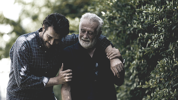 Two people holding each other