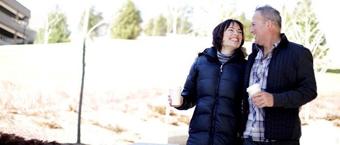 happy couple smiling and embracing