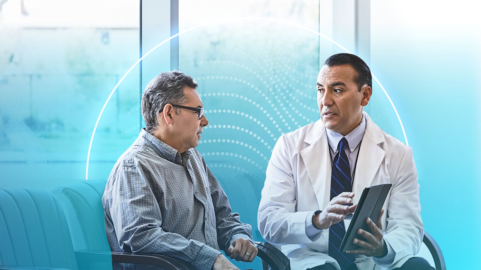 Dr with a patient holding a tablet