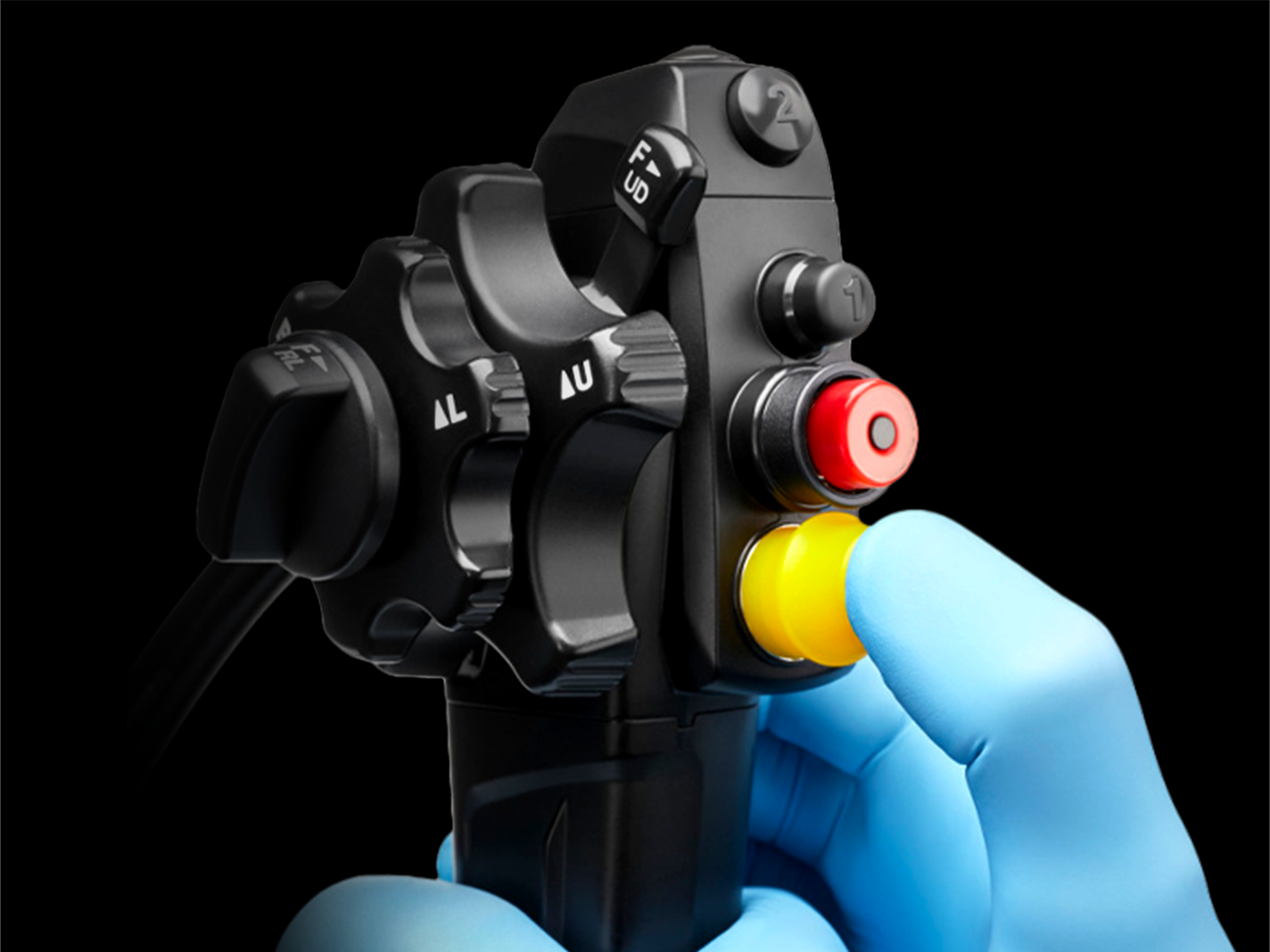 A physician holding an EXALT™ Model D Single-Use Duodenoscope with a Porpoise Air/Water Cleaning Adapter.