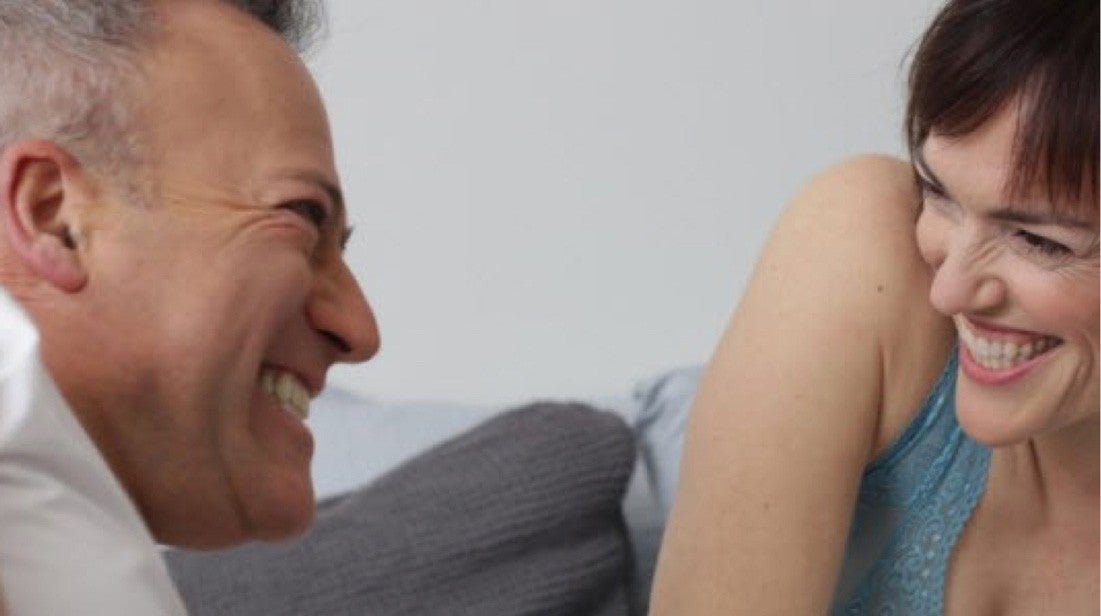 Couple smiling at each other