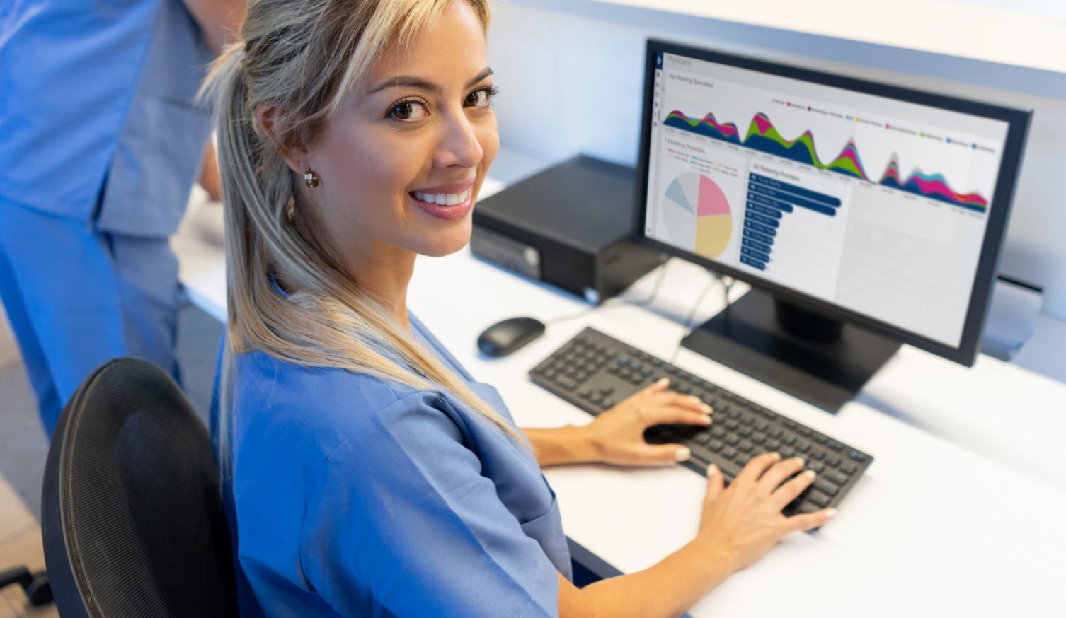 A medical professional using HAWKEYE software