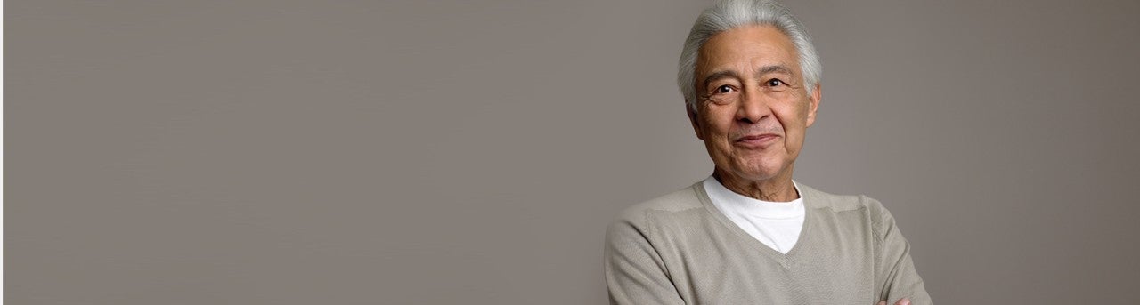 Man smiling looking straight ahead