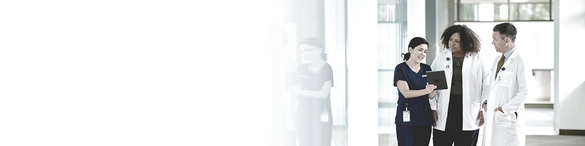 three physicians having a discussion