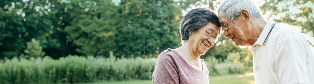 Husband and wife enjoying each other’s company outside    