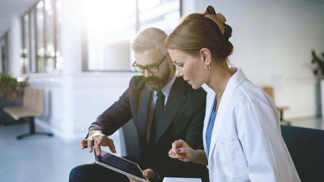 physician with industry partner