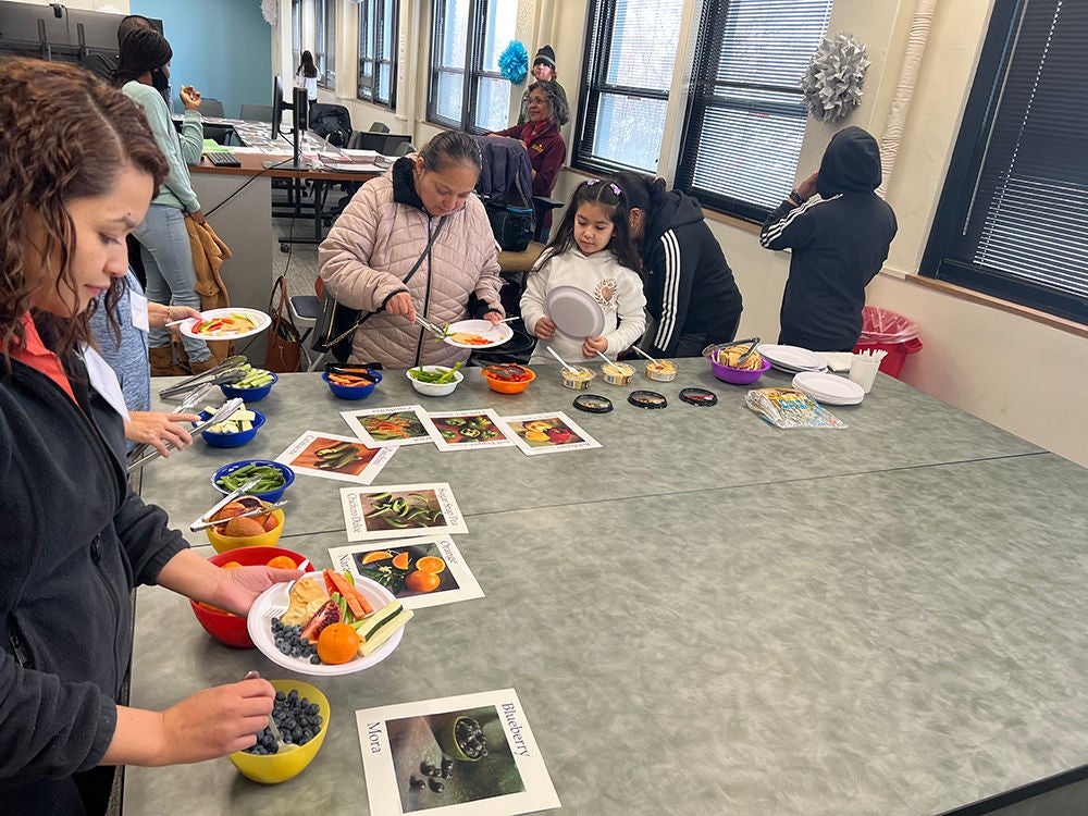 Group of kids with parents doing some activity inside the office.