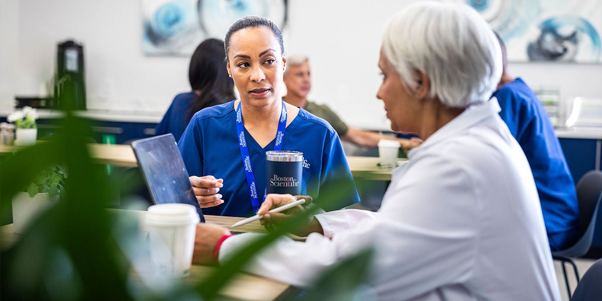 female physician speaking with a patient during a consultation