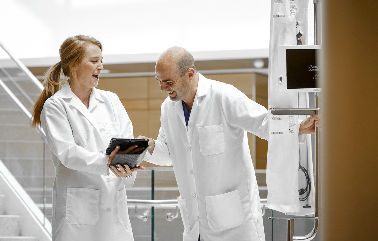 doctor in mask looking down