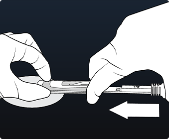 Hands pushing plunger of LUX-Dx Insertion Tool fully to place device in pocket.