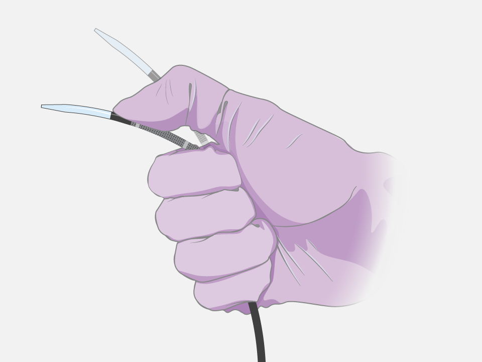 Hand in surgical glove bends the single, seamless transseptal dilator of the VersaCross Connect Access Solution for FARADRIVE.