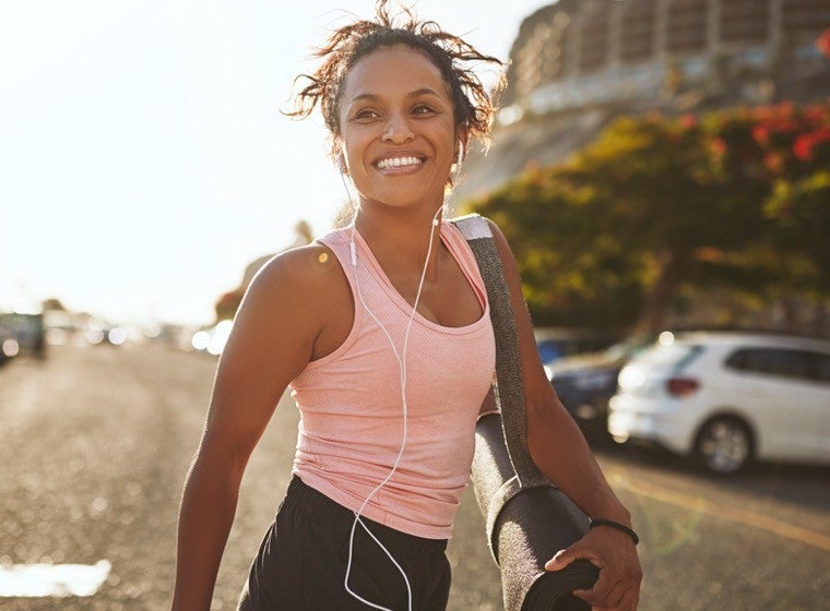 Two grandparents picking flowers with their grandchildren 