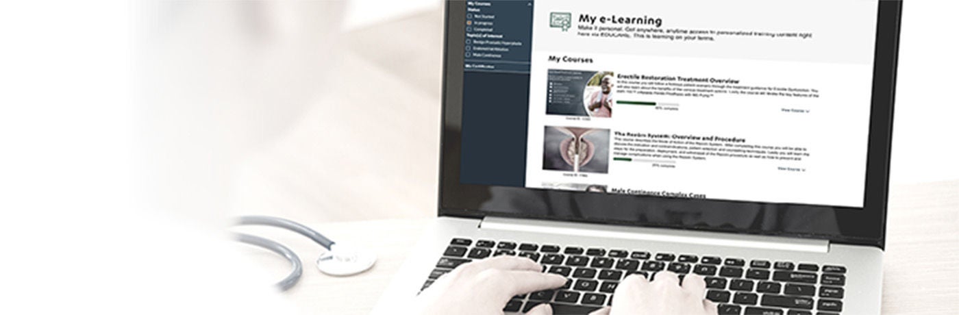 Hands on keyboard of laptop with "My e-Learning" on the screen.