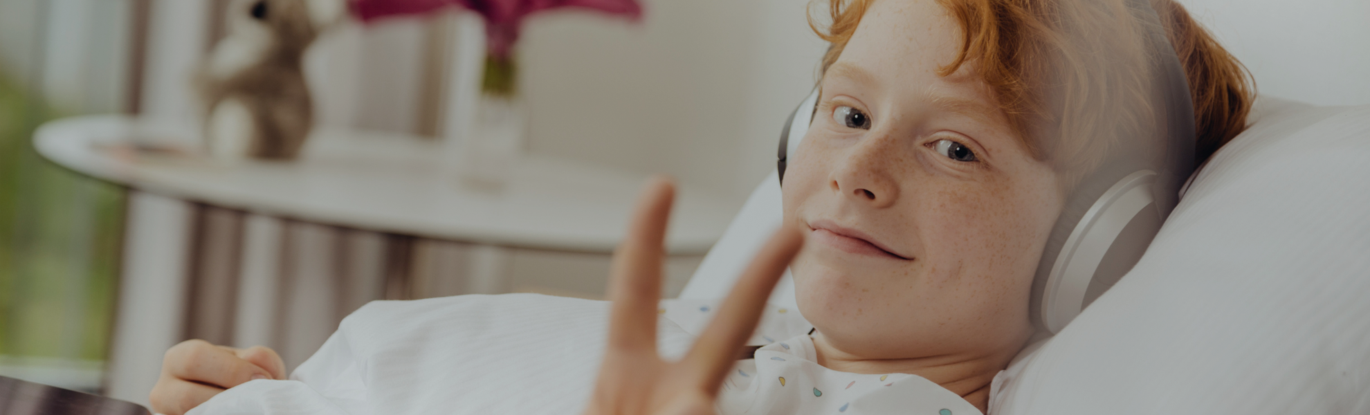 Surgeon in the OR holding stone device.