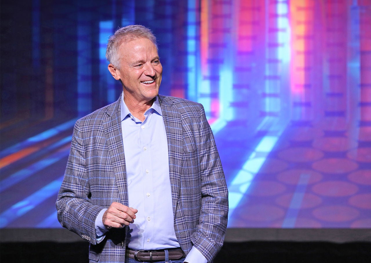 Mike Mahoney Boston Scientific Chairman and CEO smiling from a stage.