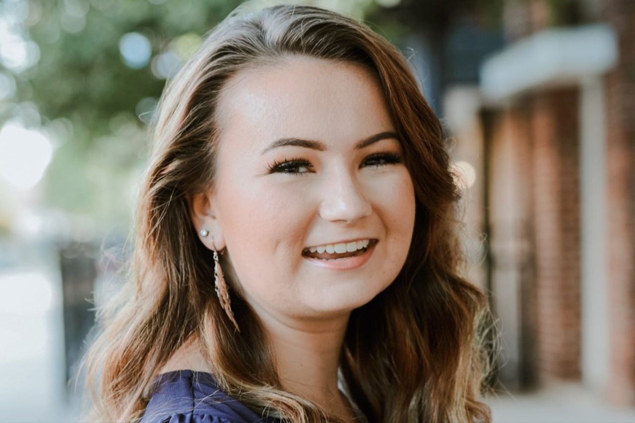 Head shot of young  smiling girl.