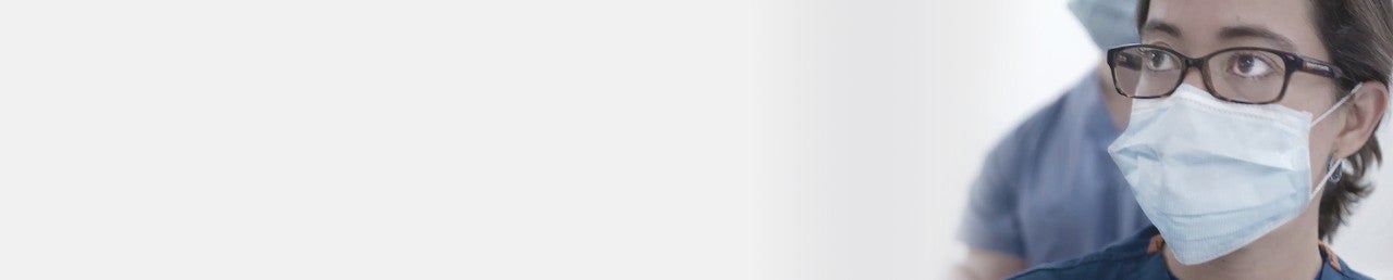 medical professional in mask closeup 