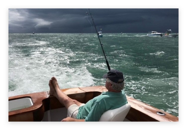 Pete fishing on his boat