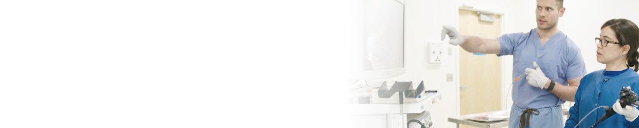 two physicians holding clips