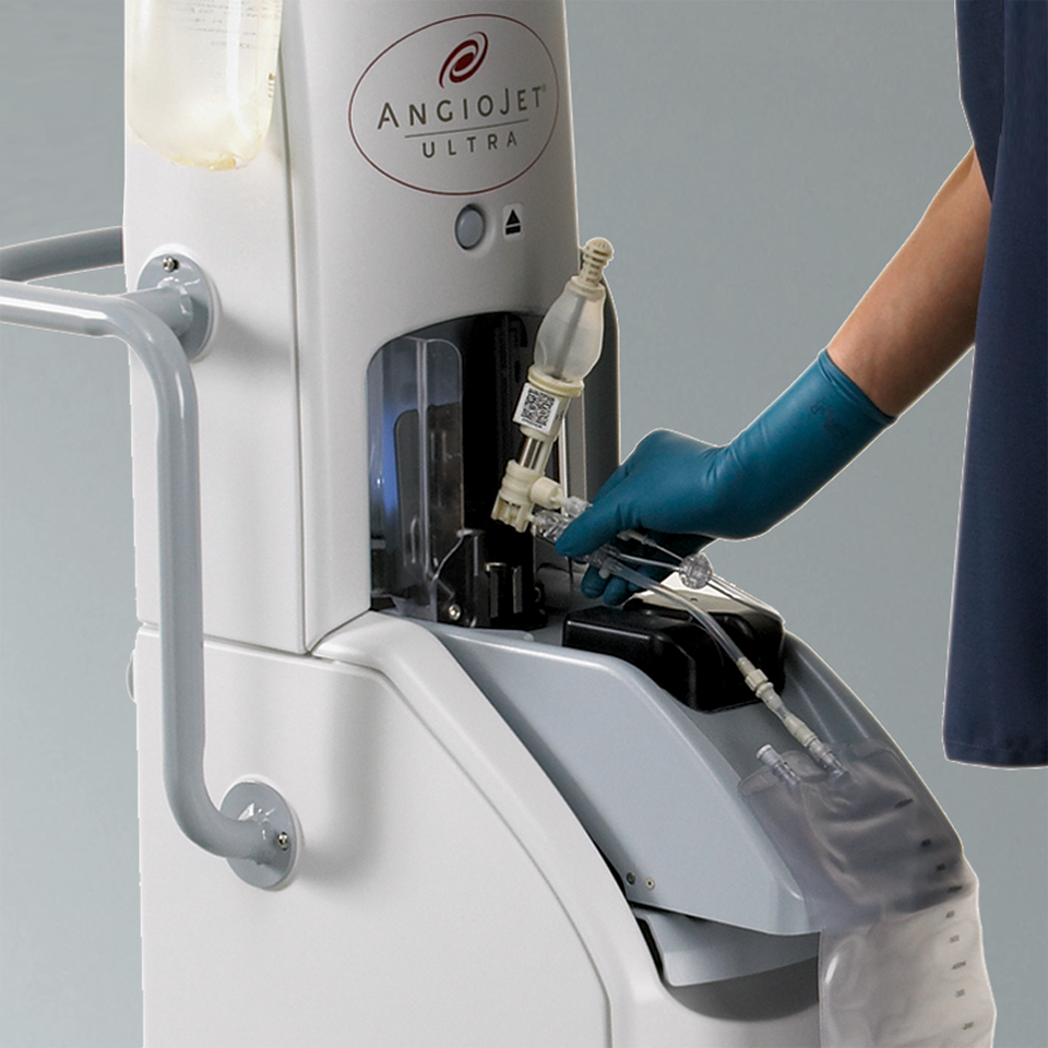 Collection bag being discarded by gloved hand into console.