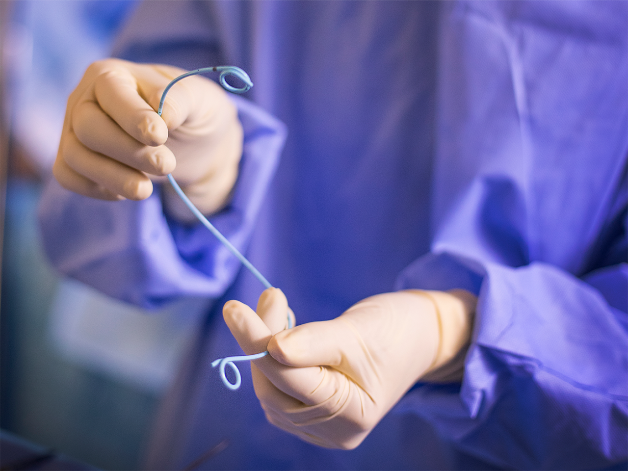 Doctor holding Tria stent