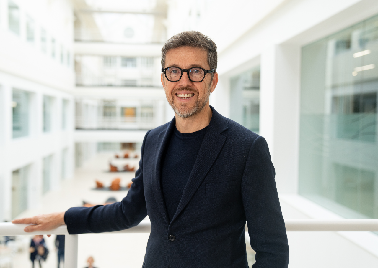 Xavier Bertrand president of Boston Scientific EMEA smiling while leaning on a railing