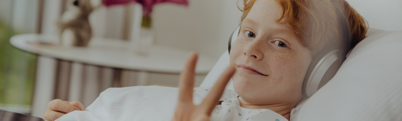 Surgeon in the OR holding stone device.