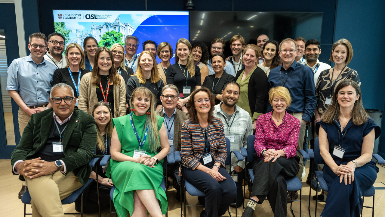 Boston Scientific employees smiling while taking a picture during a sustainability expertise meeting