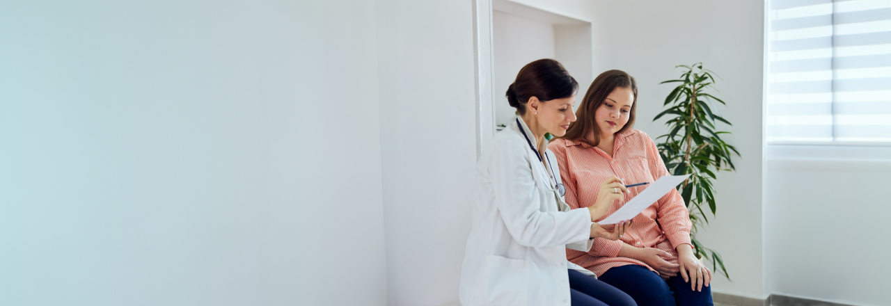 Doctor talking to patient