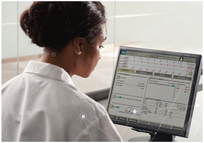 Physician viewing a real-time, online meeting via the Heart Connect System.