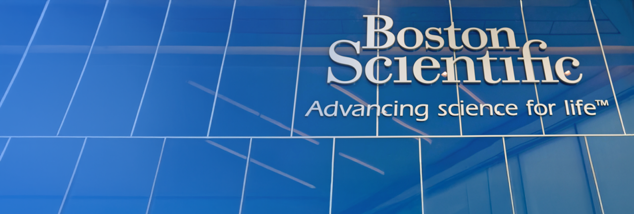 Boston Scientific: Advancing science for life” lettering on exterior of modern office building