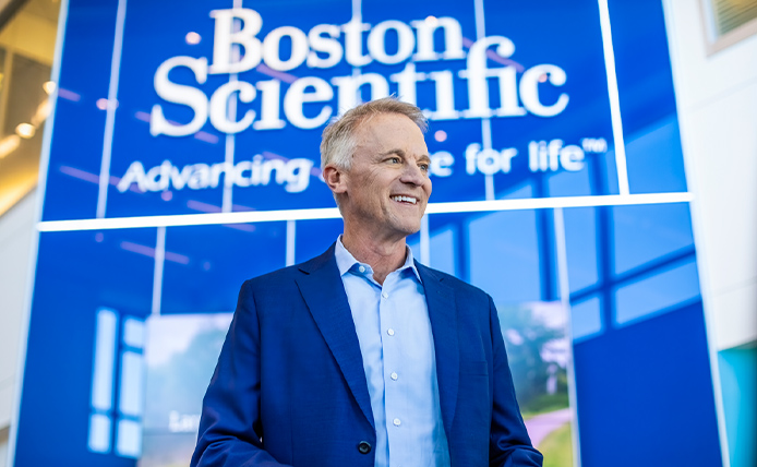 Boston Scientific CEO Michael F. Mahoney speaking into microphone.