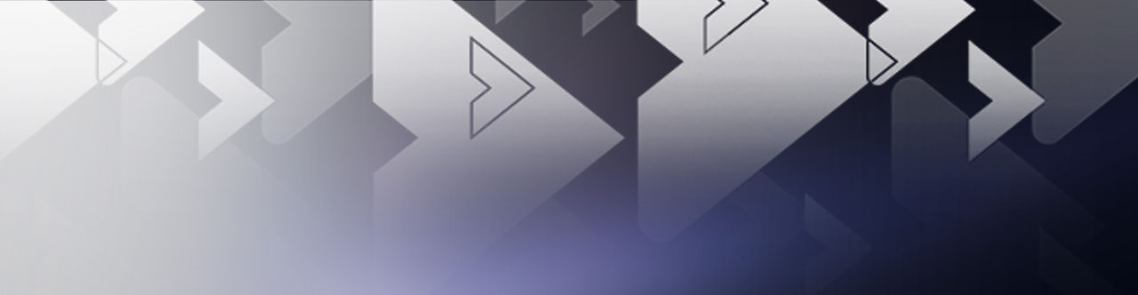 Image of a woman working at a laptop in a hospital setting