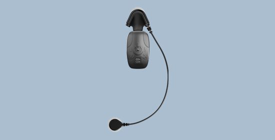 BodyGuardian Mini device with attached ECG leads on light blue background 