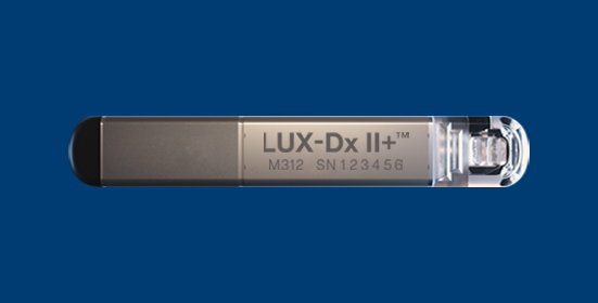 LUX-Dx ICM device on dark blue background 